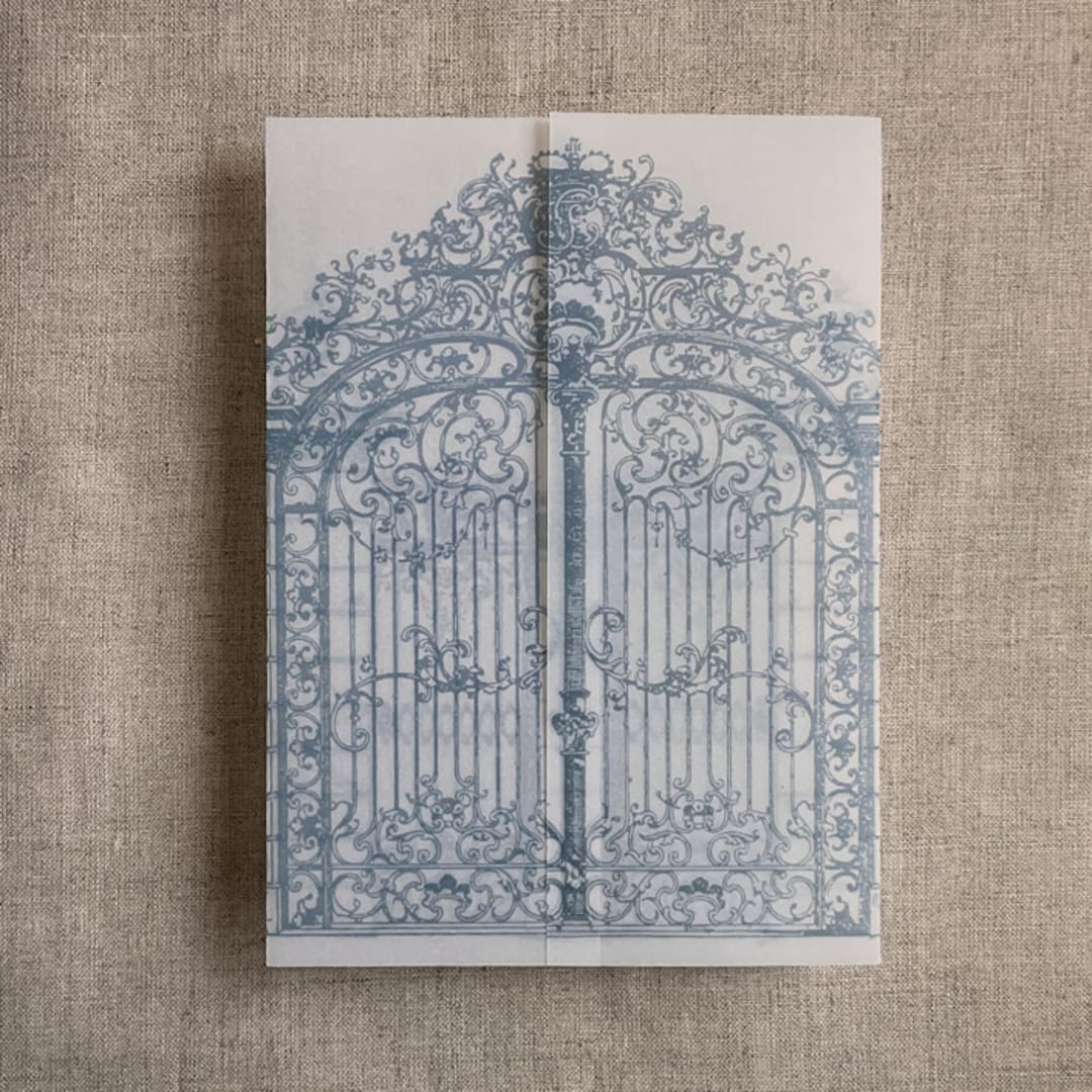 "Steel blue vintage style arched gate to the palace gardens vellum wrap for 5x7 card | pack of 10" - Invitation Jackets and Overlays in blue by Ivory Invitations