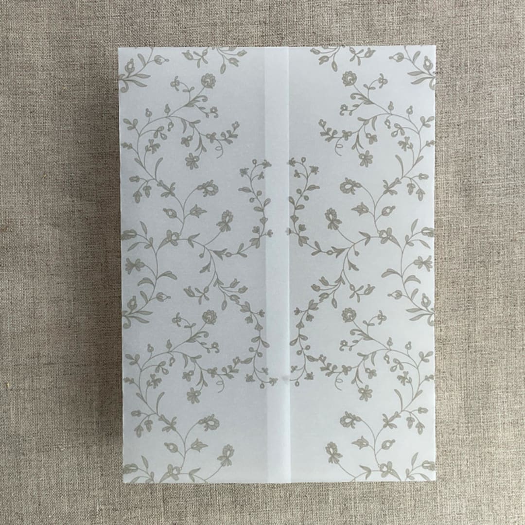 "Oyster gray dainty floral vines printed vellum wrap for 5x7 card  | pack of 10" - Invitation Jackets and Overlays in gray by Ivory Invitations