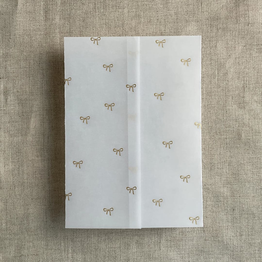 "Baby ribbon bows gold foil stamping vellum wrap for 5x7 card | pack of 10" - Invitation Jackets and Overlays in gold by Ivory Invitations