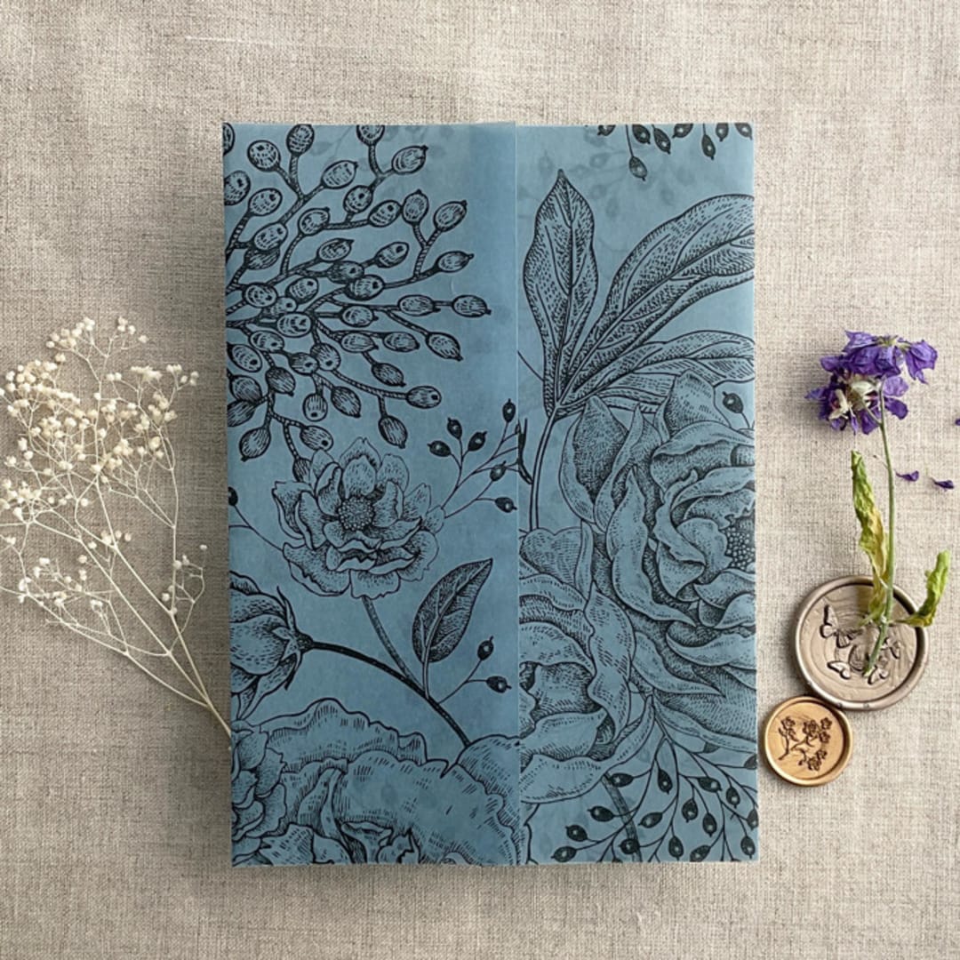 "Elegant peonies and berries black printed on steel blue colored vellum wrap for 5x7 card  | pack of 10" - Invitation Jackets and Overlays in blue by Ivory Invitations