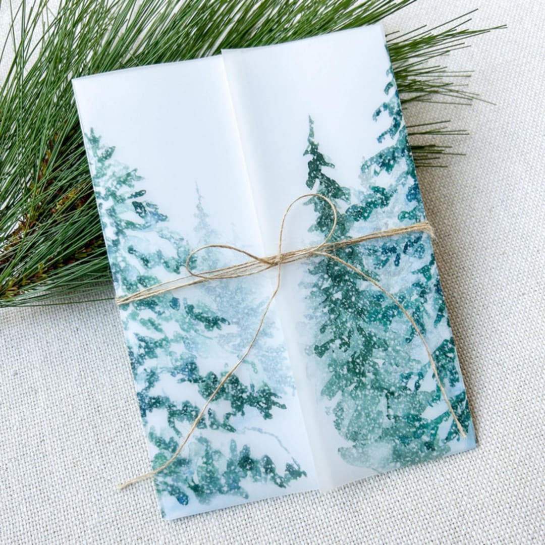 "Snowy Pines Vellum Jackets | Set of 10" - Invitation Jackets and Overlays in green by Megan Tendler