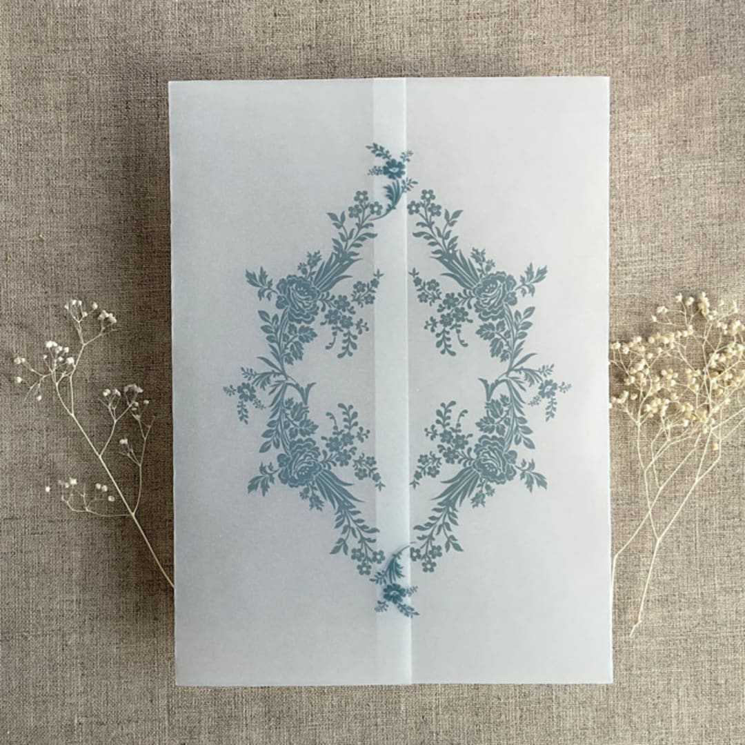 "Steel blue print French floral crest vellum wrap for 5x7 card | pack of 10" - Invitation Jackets and Overlays in blue by Ivory Invitations