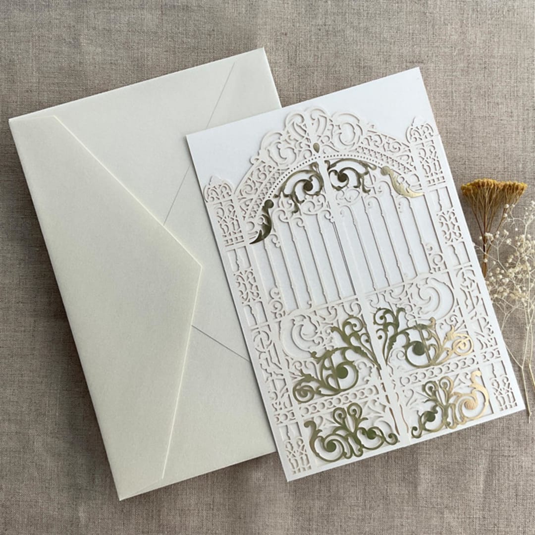 "Ivory Castle Gate Lasercut Jacket for 5x7 inch Invitation | Pack of 10 | Envelopes Included" - Invitation Jackets and Overlays in white by Ivory Invitations