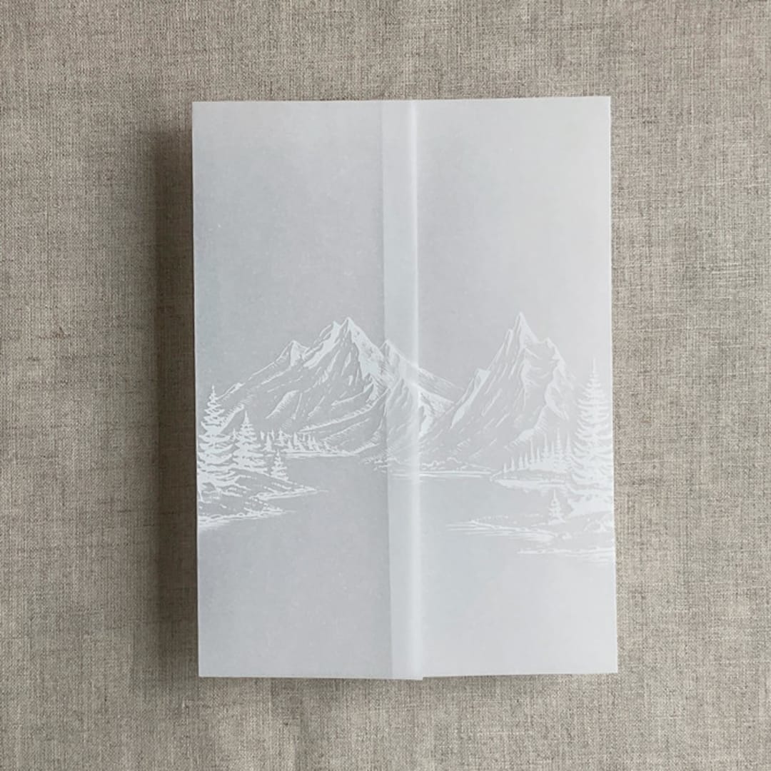 "White ink mountain sketch printed vellum wrap for 5x7 card | pack of 10" - Invitation Jackets and Overlays in white by Ivory Invitations