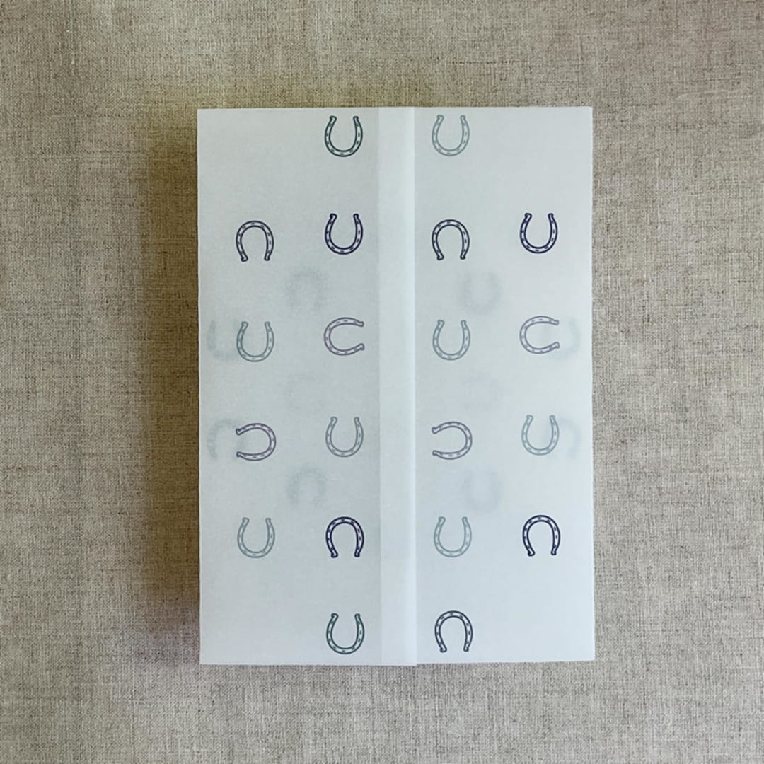 "Blue horseshoes vellum wrap for 5x7 card | pack of 10" - Invitation Jackets and Overlays in blue by Ivory Invitations