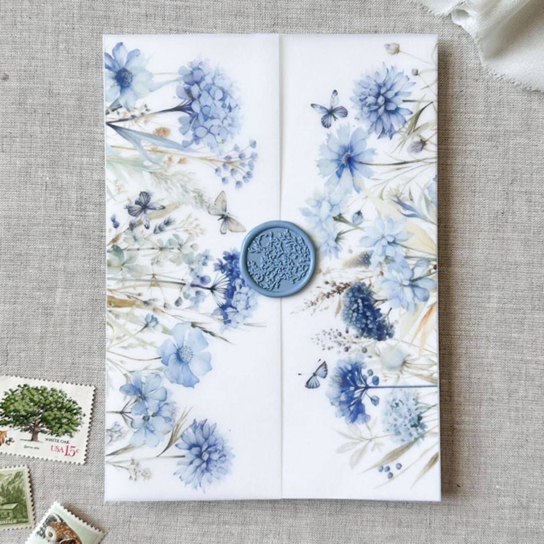 "Blue florals and butterflies vellum jacket | Set of 10" - Invitation Jackets and Overlays in blue by Maria Ferrer G.