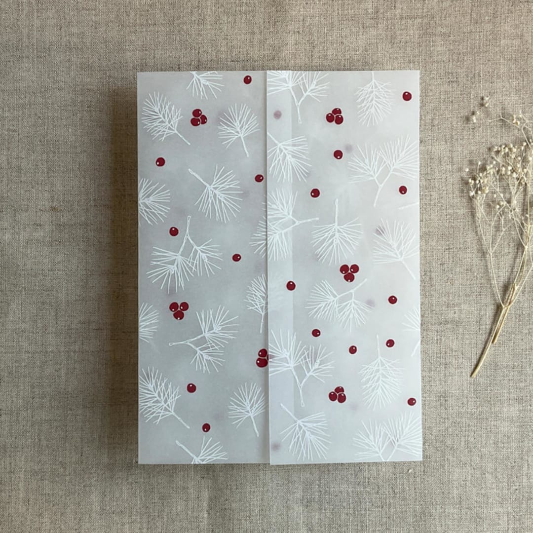"Holly berries white pine leaves printed vellum wrap for 5x7 card | pack of 10" - Invitation Jackets and Overlays in white by Ivory Invitations
