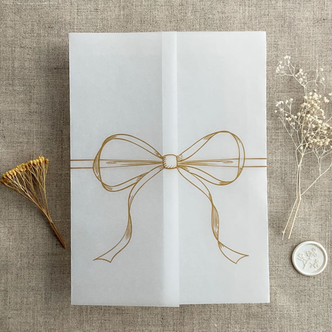 "Gold ribbon bow printed vellum wrap for 5x7 card | pack of 10" - Invitation Jackets and Overlays in gold by Ivory Invitations
