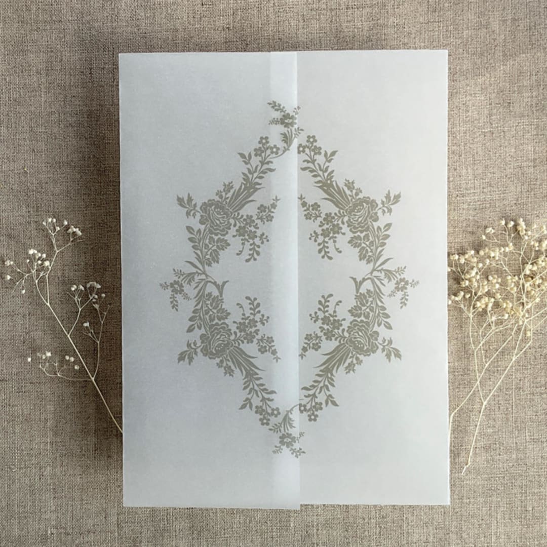 "Oyster print French floral crest vellum wrap for 5x7 card | pack of 10" - Invitation Jackets and Overlays in gray by Ivory Invitations