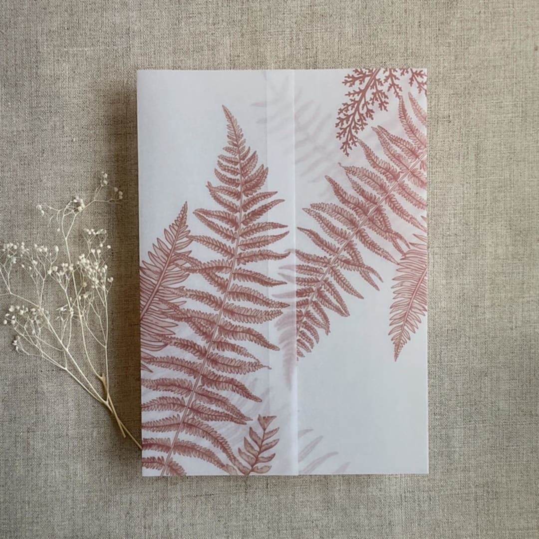 "Rosy mauve fern leaves greenery printed vellum wrap for 5x7 card  | pack of 10" - Invitation Jackets and Overlays in pink by Ivory Invitations