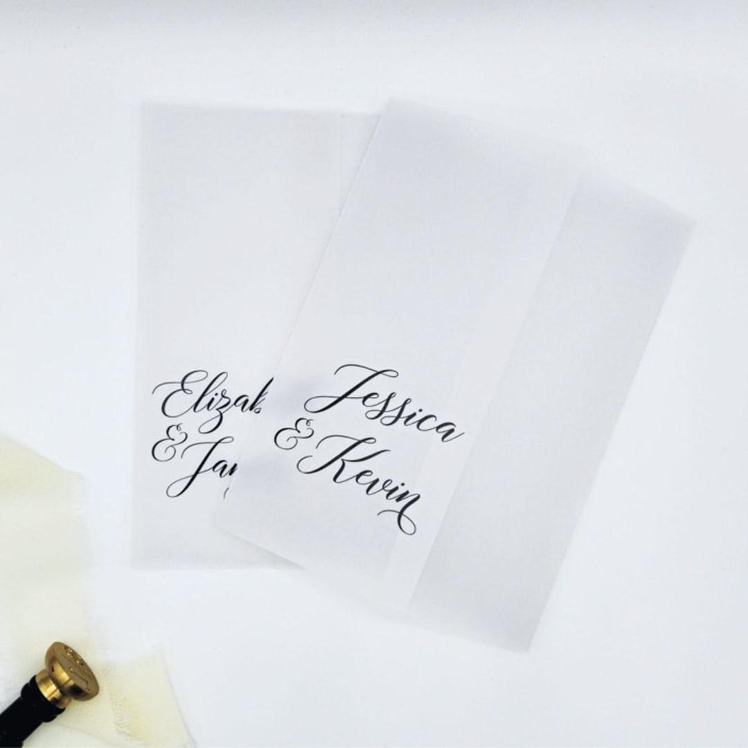 "Personalized Vellum Wrap with Couples Names (Set of 10)" - Invitation Jackets and Overlays in black by Caroline Russo