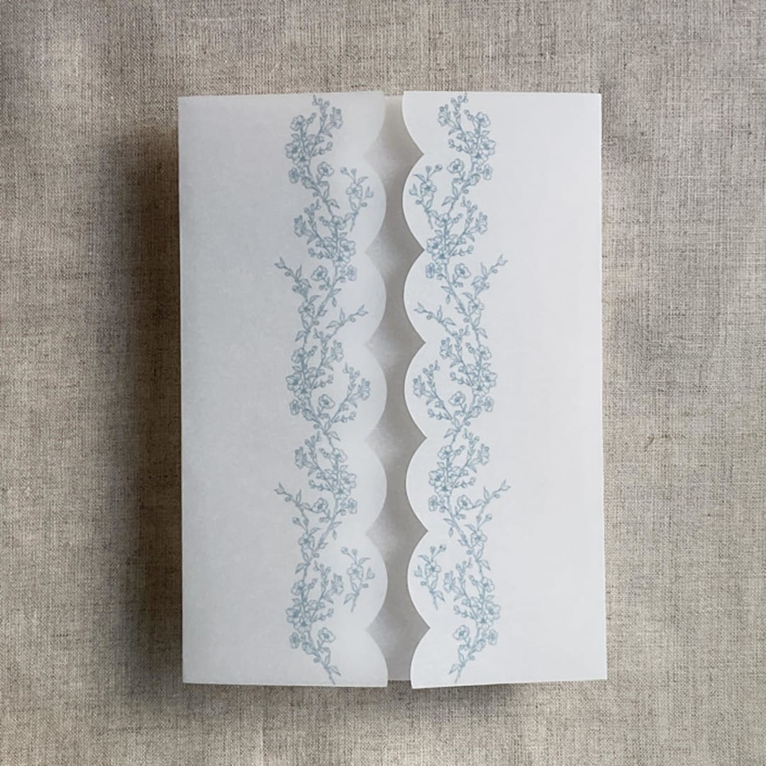 "Steel blue floral printed scallop edge vellum wrap for 5x7 card | pack of 10" - Invitation Jackets and Overlays in blue by Ivory Invitations