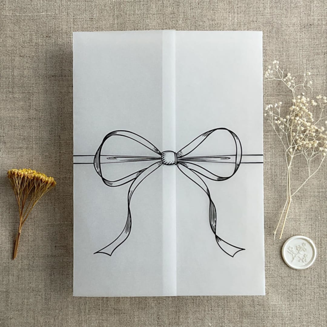 "Black ribbon bow printed vellum wrap for 5x7 card | pack of 10" - Invitation Jackets and Overlays in black by Ivory Invitations