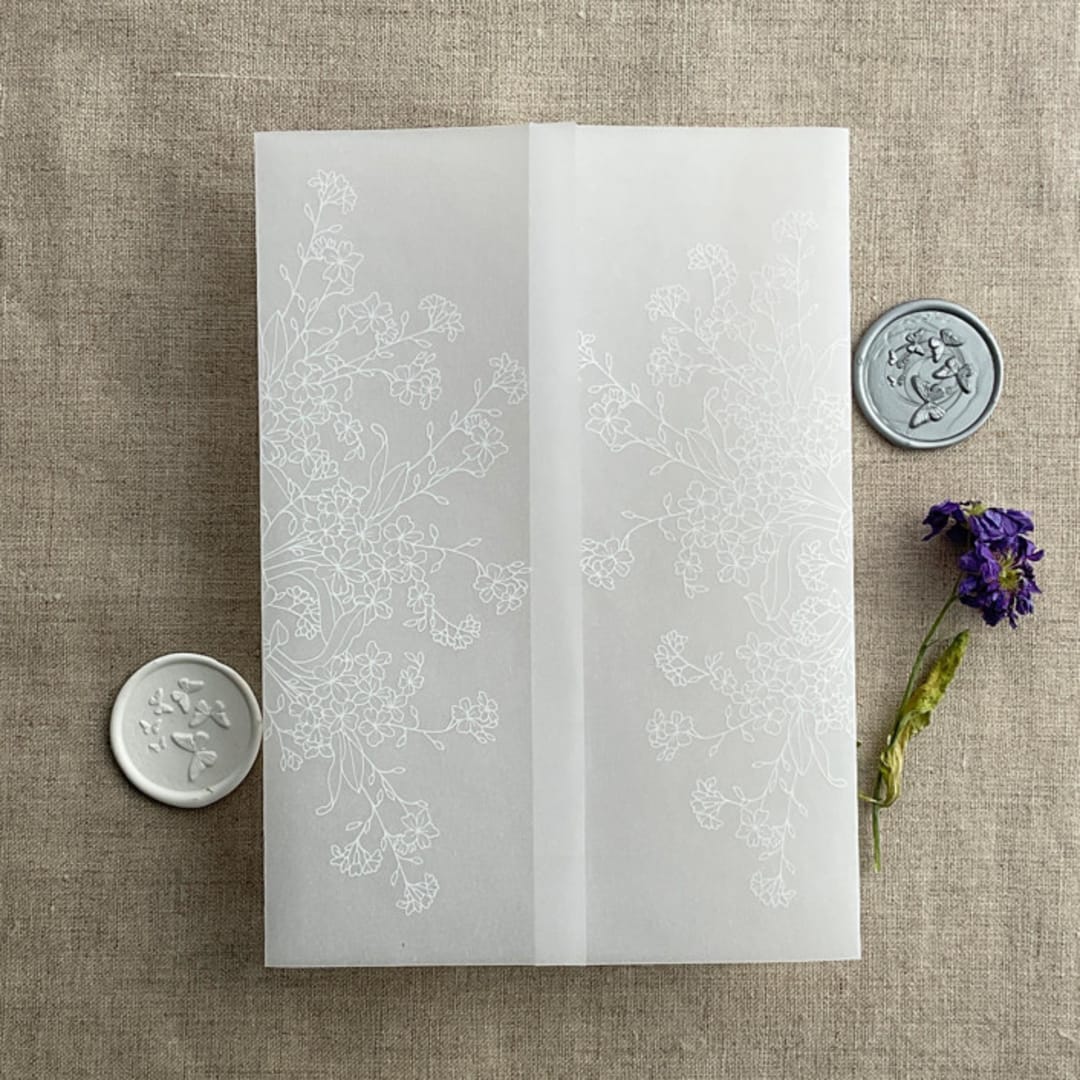 "White print flower arrangement printed vellum wrap for 5x7 card | pack of 10" - Invitation Jackets and Overlays in white by Ivory Invitations