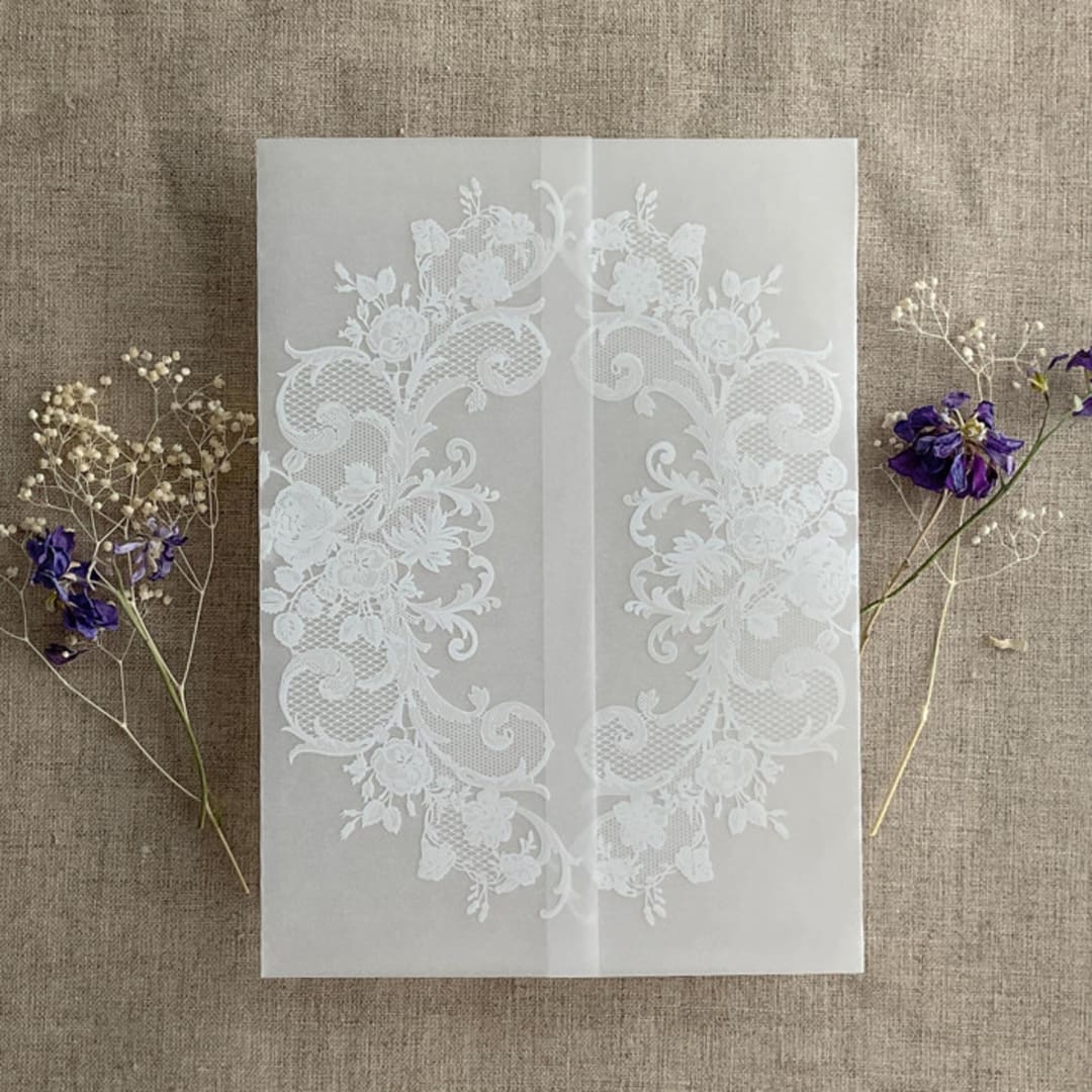 "White La belle antique rose floral lace printed vellum wrap for 5x7 card  | pack of 10" - Invitation Jackets and Overlays in white by Ivory Invitations