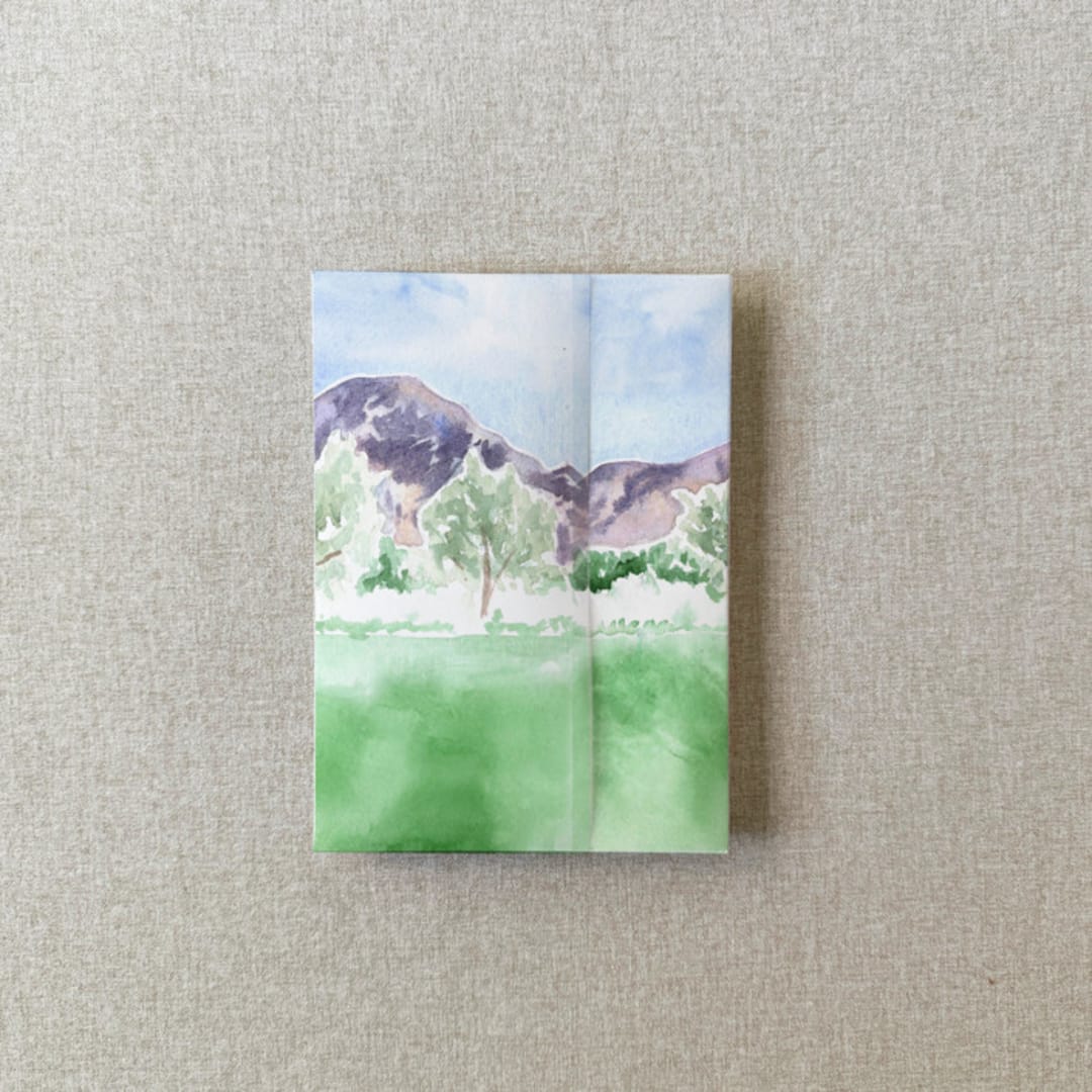 "Mountain Watercolor Vellum Jacket for Wedding Invitations | A7 | Set of 10" - Invitation Jackets and Overlays in multicolor by Cotton and Bow