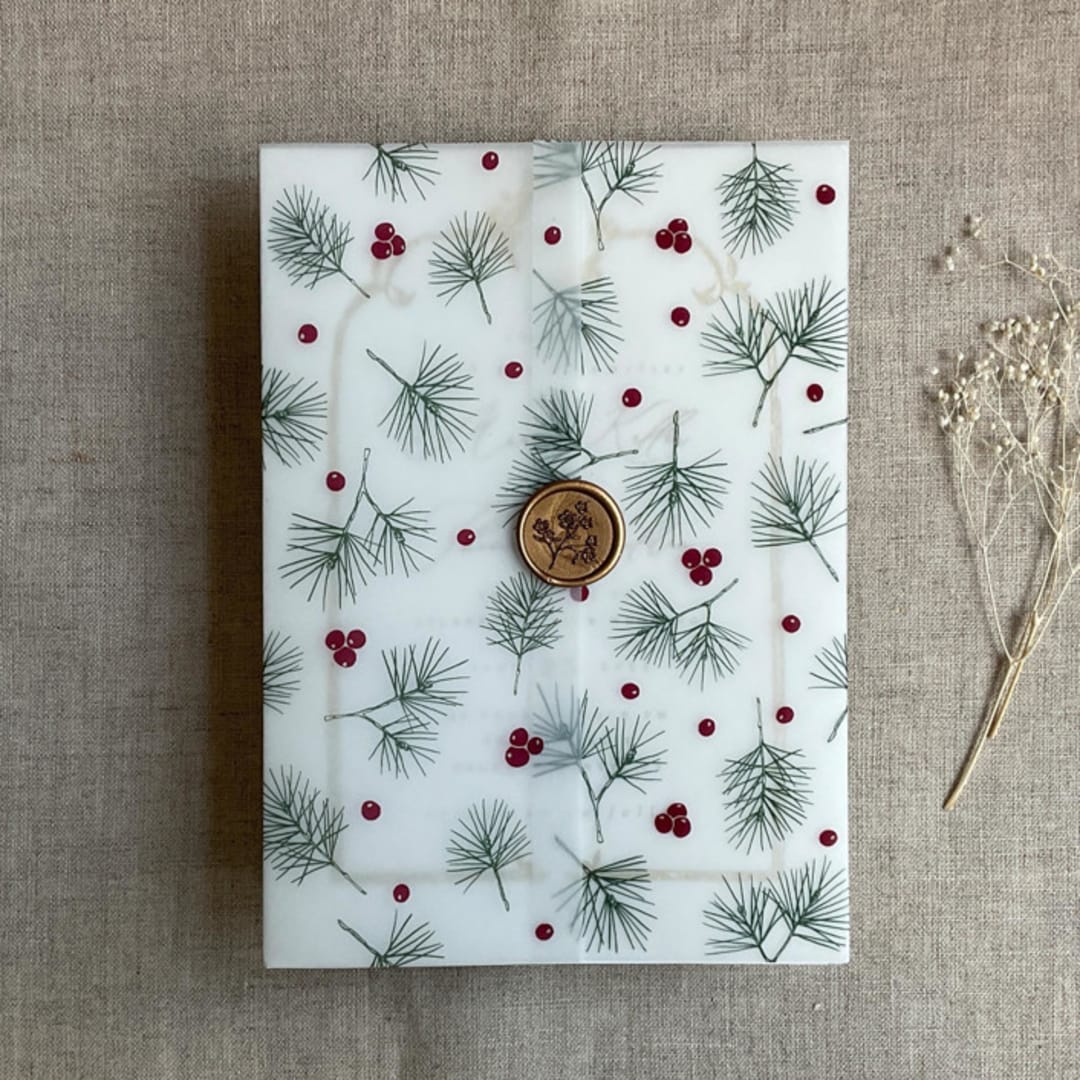 "Holly berries green pine leaves printed vellum wrap for 5x7 card | pack of 10" - Invitation Jackets and Overlays in green by Ivory Invitations
