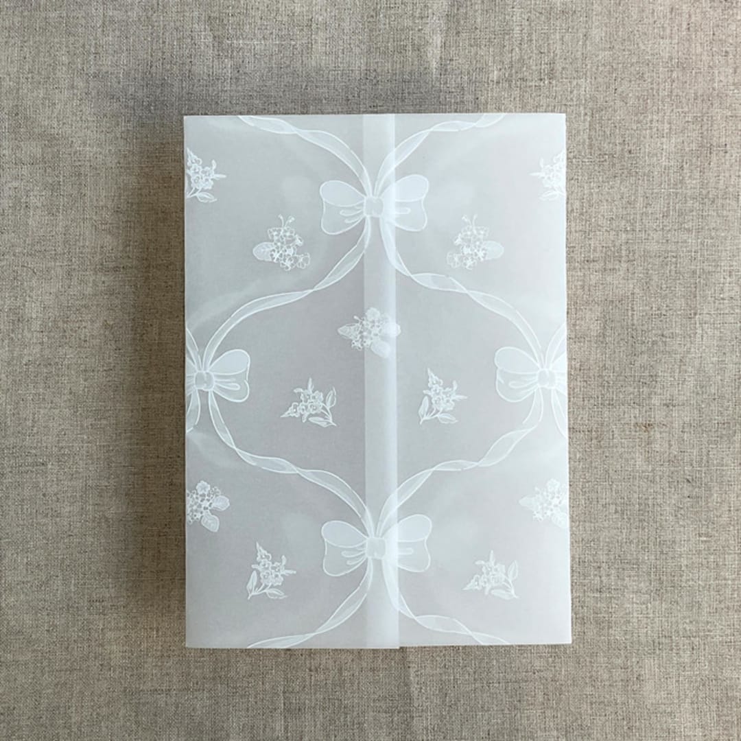 "White genie floral bows printed vellum wrap for 5x7 card | pack of 10" - Invitation Jackets and Overlays in white by Ivory Invitations