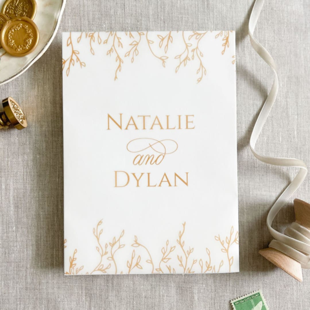 "Custom couple's names and botanicals in faux gold vellum wraps for invitations | Set of 10" - Invitation Jackets and Overlays in gold by Maria Ferrer G.