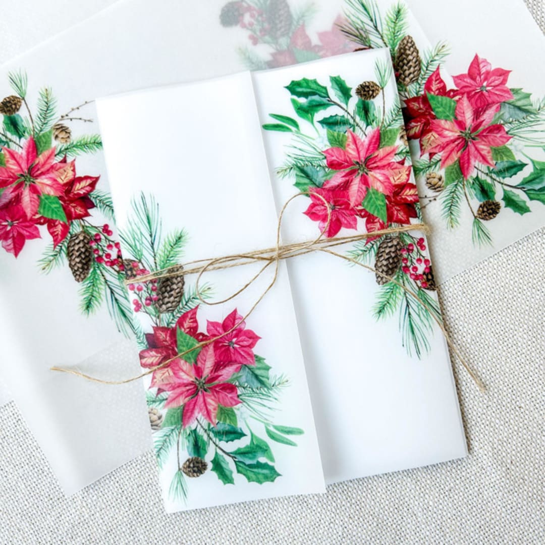 "Poinsettia & Pinecones Vellum Jacket | Set of 10" - Invitation Jackets and Overlays in green by Megan Tendler