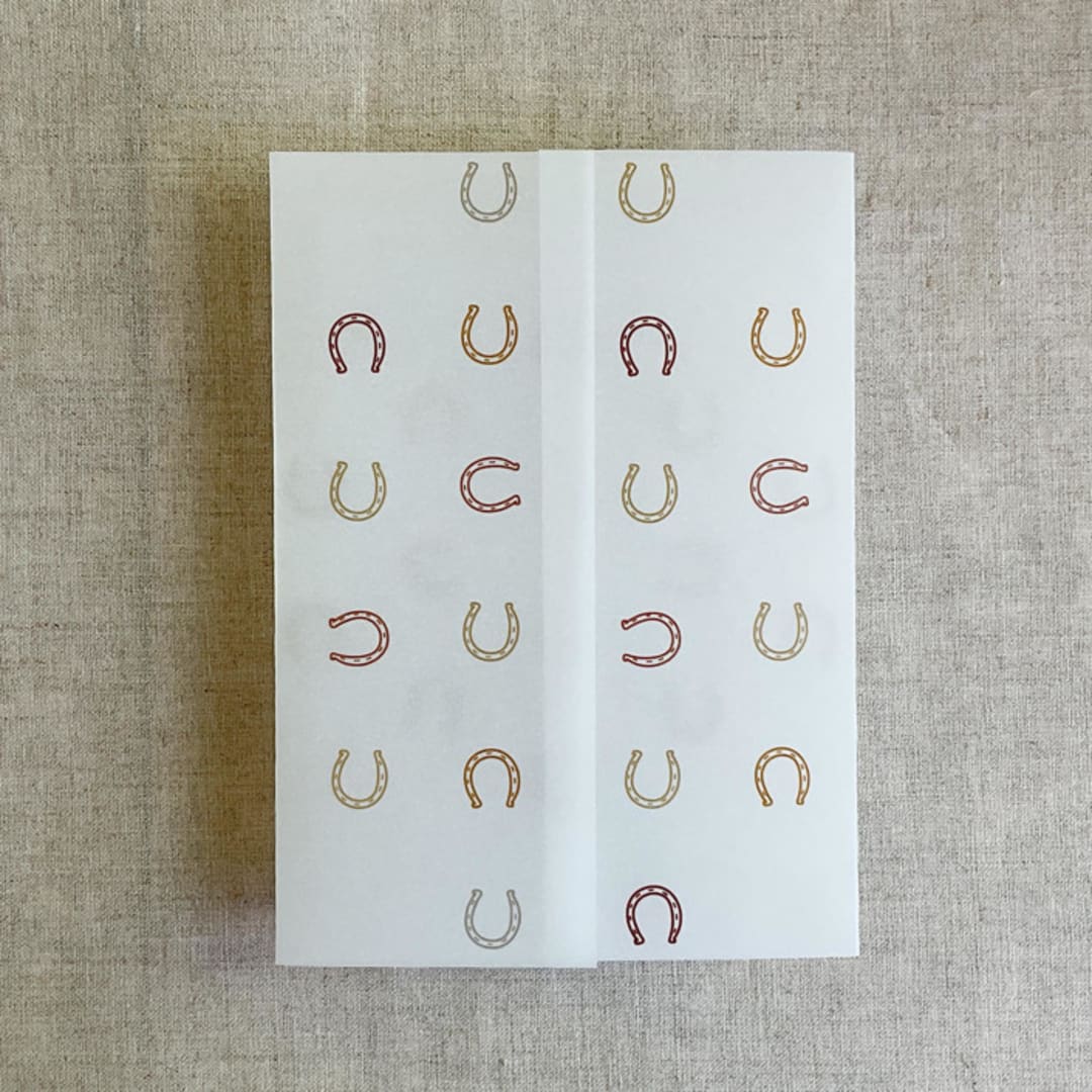 "Brown shades horseshoes vellum wrap for 5x7 card | pack of 10" - Invitation Jackets and Overlays in multicolorassorted-colors by Ivory Invitations