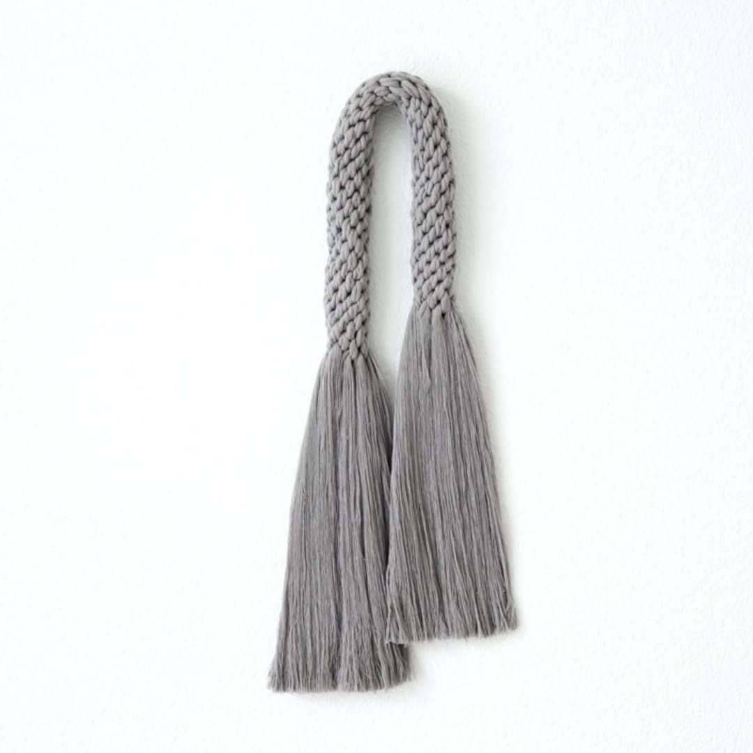 "Knotted tassel wall hanging" - Original Textile Art in gray by Bharti Trivedi