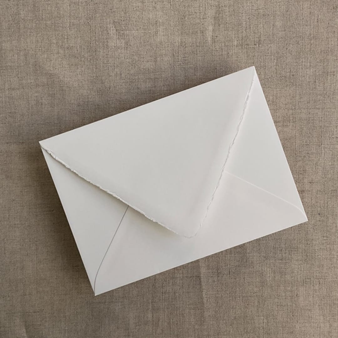 "Soft white A7 deckled edge euro flap envelope | PACK of 10" - Envelopes in white by Ivory Invitations