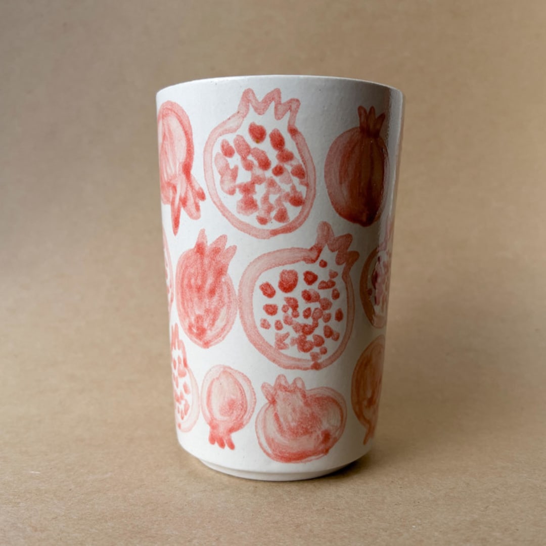 "Unique handmade ceramic cup with pomegranates" - Mugs and Teacups in multicolor by Alexandra Dzh