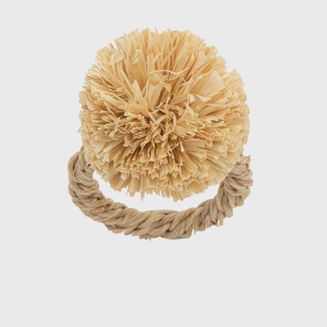 "Straw pompom napkin rings, natural, set of four" - Tabletop Accessories in natural by Joanna Buchanan
