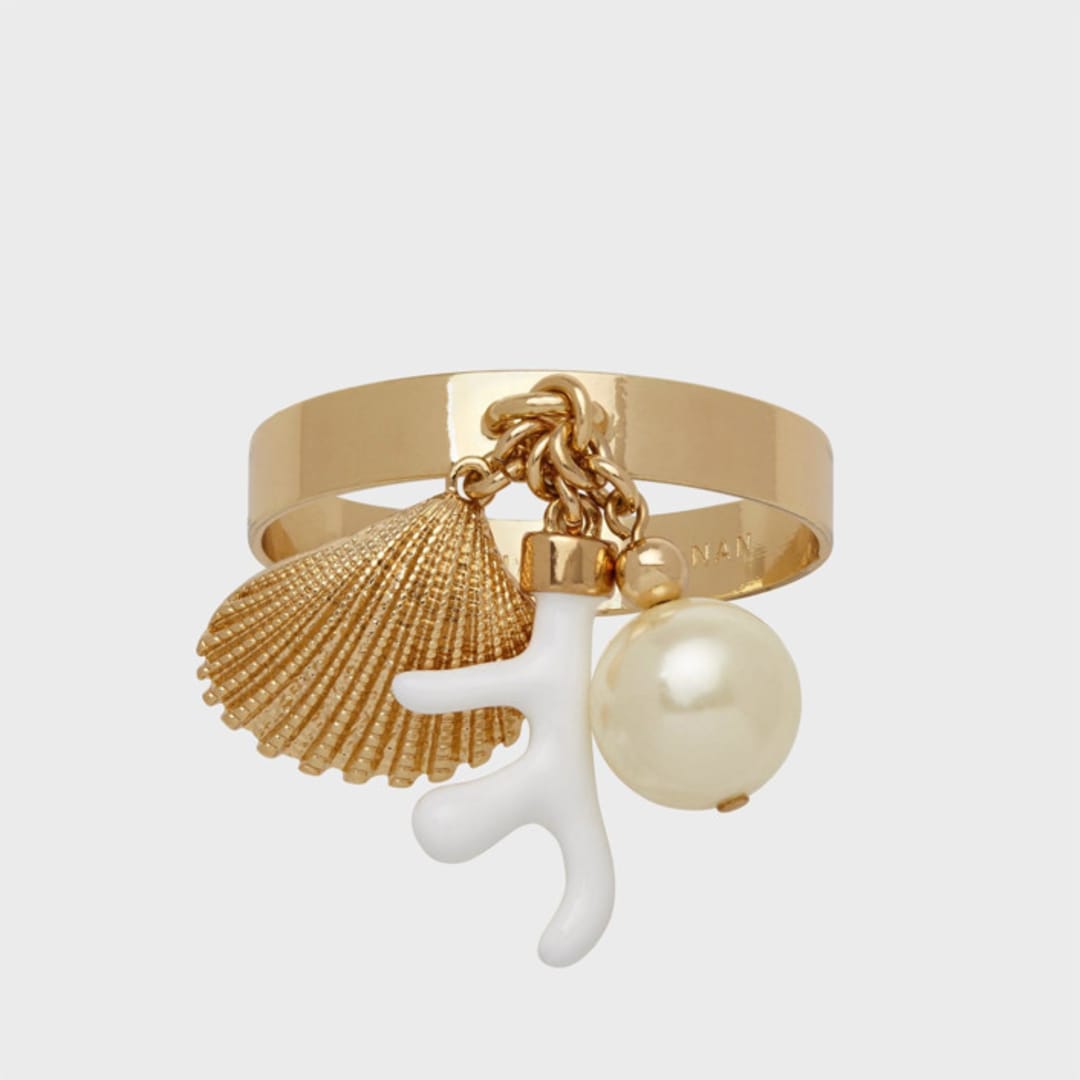 "Coral and shell skinny napkin rings, cream, set of four" - Tabletop Accessories in gold by Joanna Buchanan