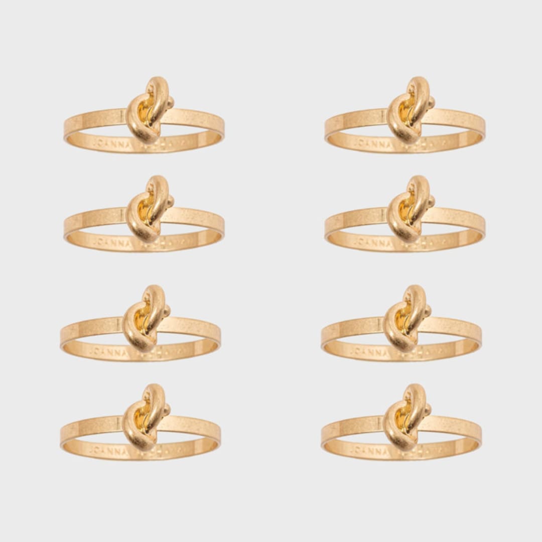 "Knot napkin rings, set of eight" - Tabletop Accessories in brass by Joanna Buchanan
