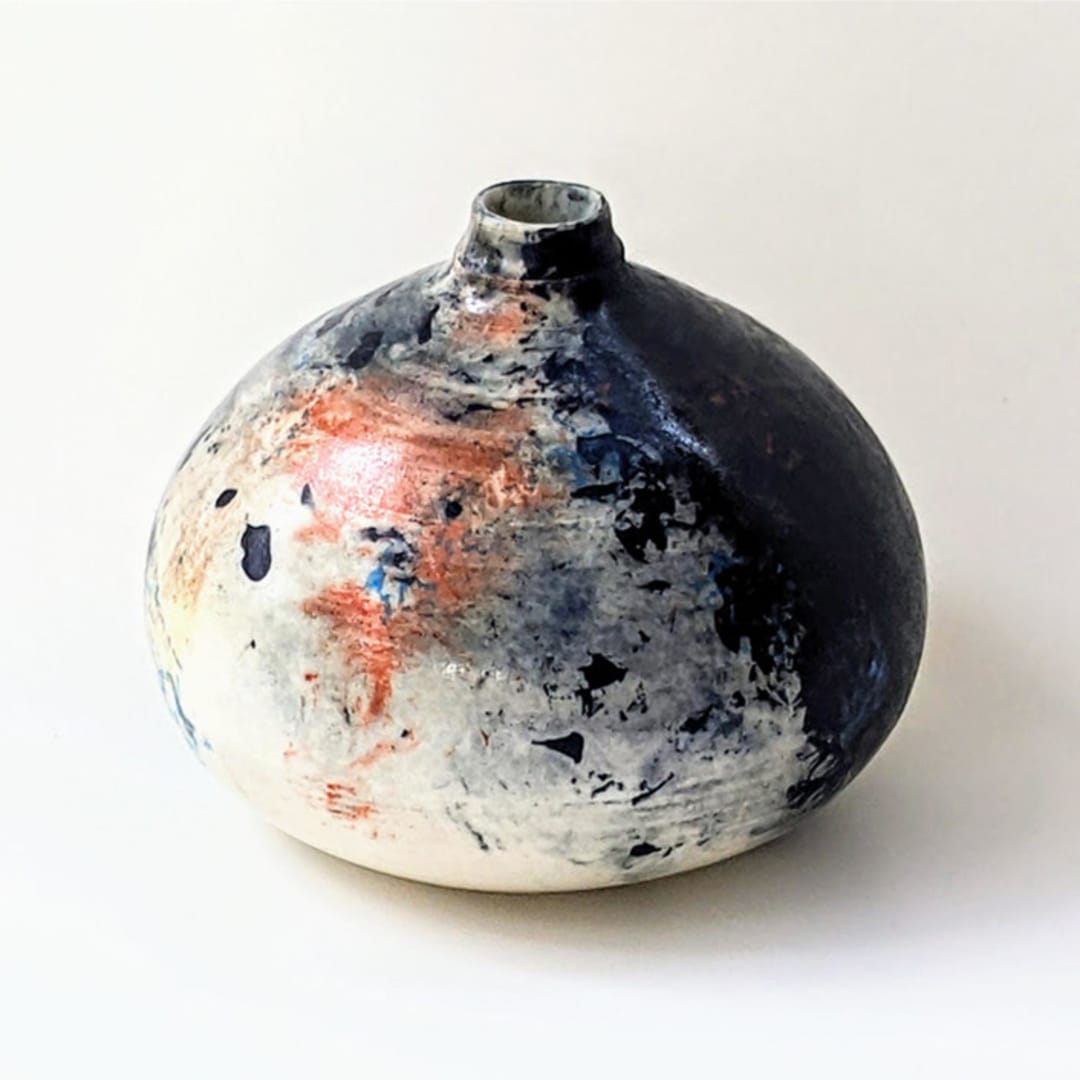 one-of-a-kind hand thrown and hand painted bud vase - black white and orange