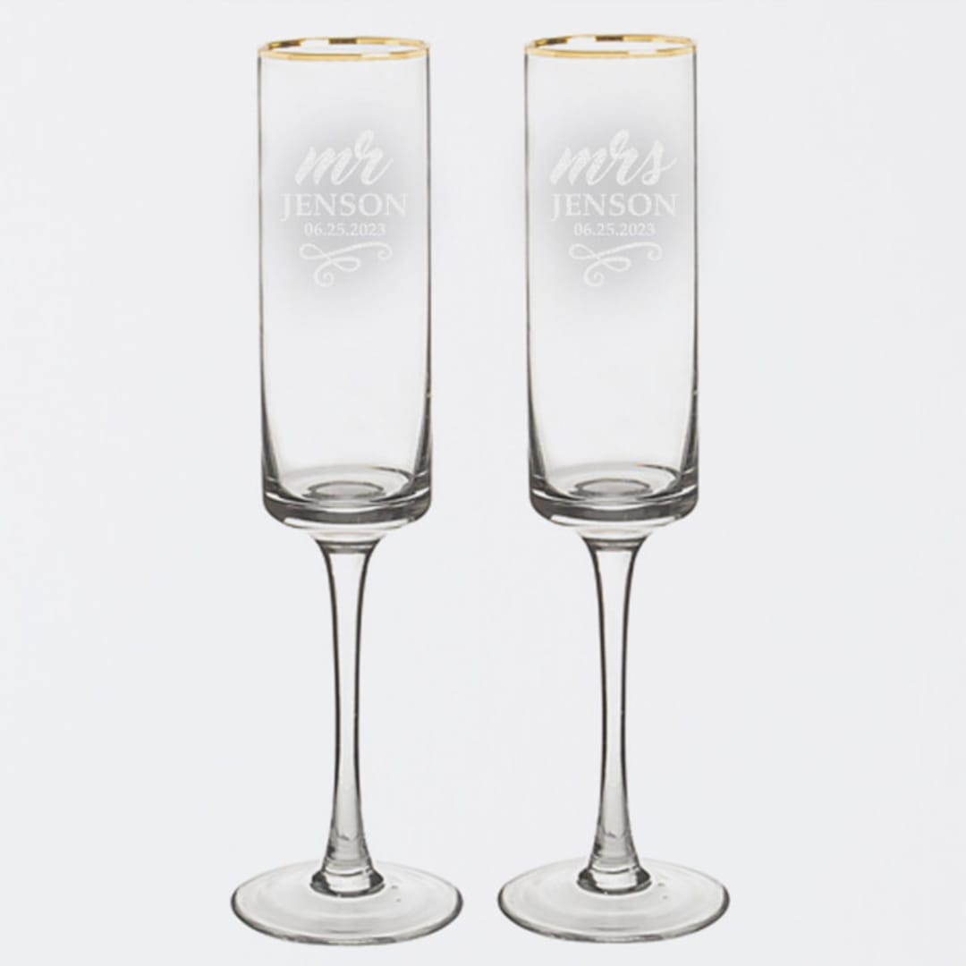 "Mr. and Mrs. Personalized Gold Rim Champagne Flutes, Set of 2" - Couple Gifts in clear by Colin Supple