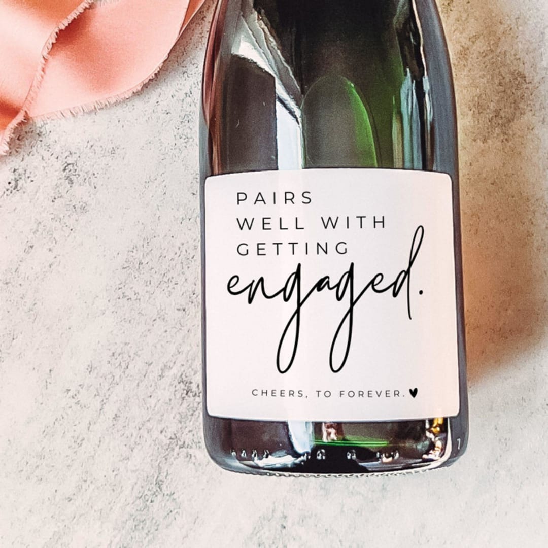 "Engagement Gift Champagne Label | Pairs well with getting engaged" - Couple Gifts in white by The Pretty Little Mess