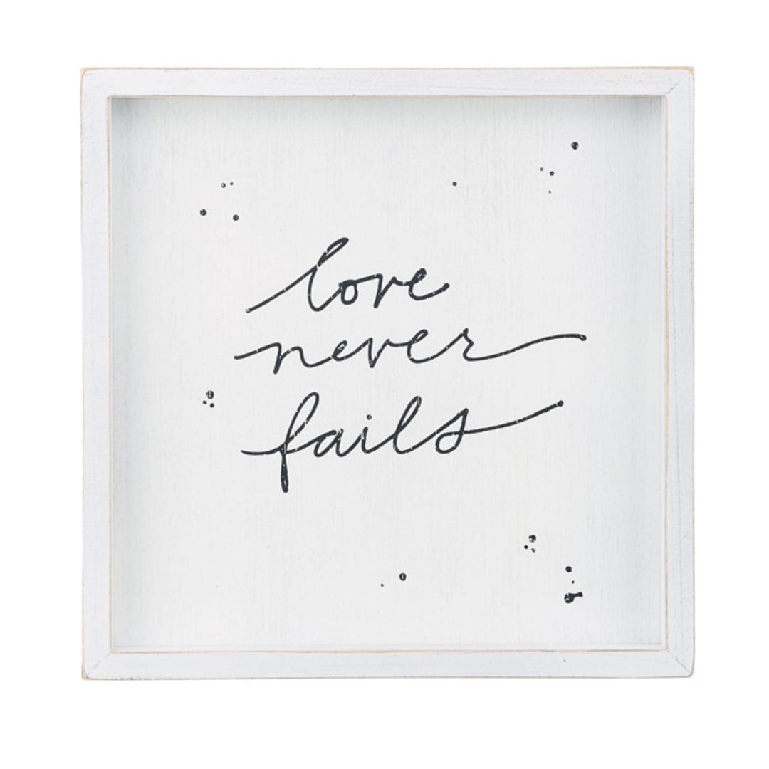 Love Never Fails Framed Board