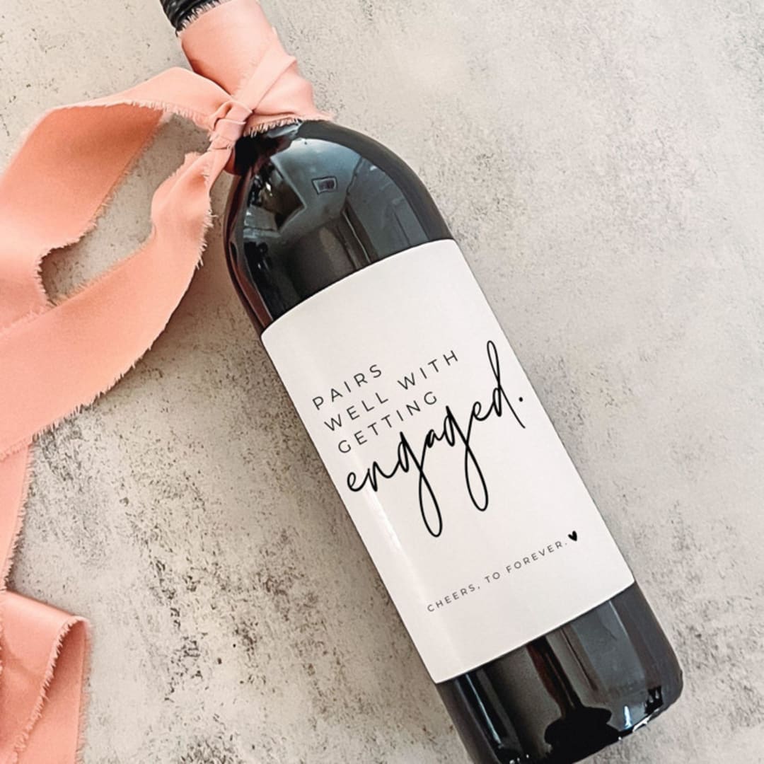 "Engagement Gift Wine Label | Pairs well with getting engaged" - Couple Gifts in white by The Pretty Little Mess