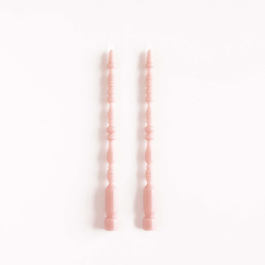 "SET OF 2 - SPINDLE LEG TAPERS // ROSEWATER" - Candles in pink by borrowed BLU