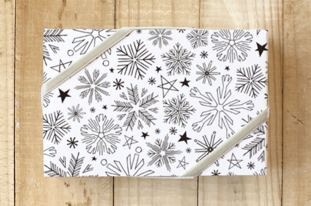 "Snow Flakes" - Wrapping Paper in White Xmas by Daniela - Front