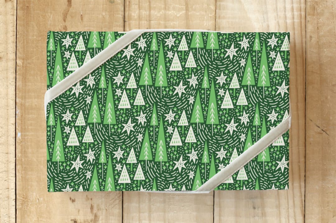 "Snowy Trees" - Wrapping Paper in Forest Green  by Surface Love - Front