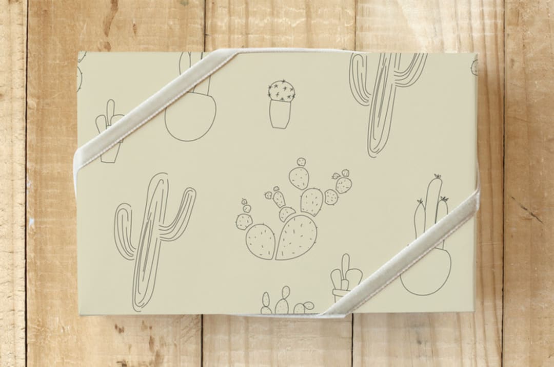 "Joshua Tree Cacti" - Wrapping Paper in Sand by DESIGN X FIVE - Front