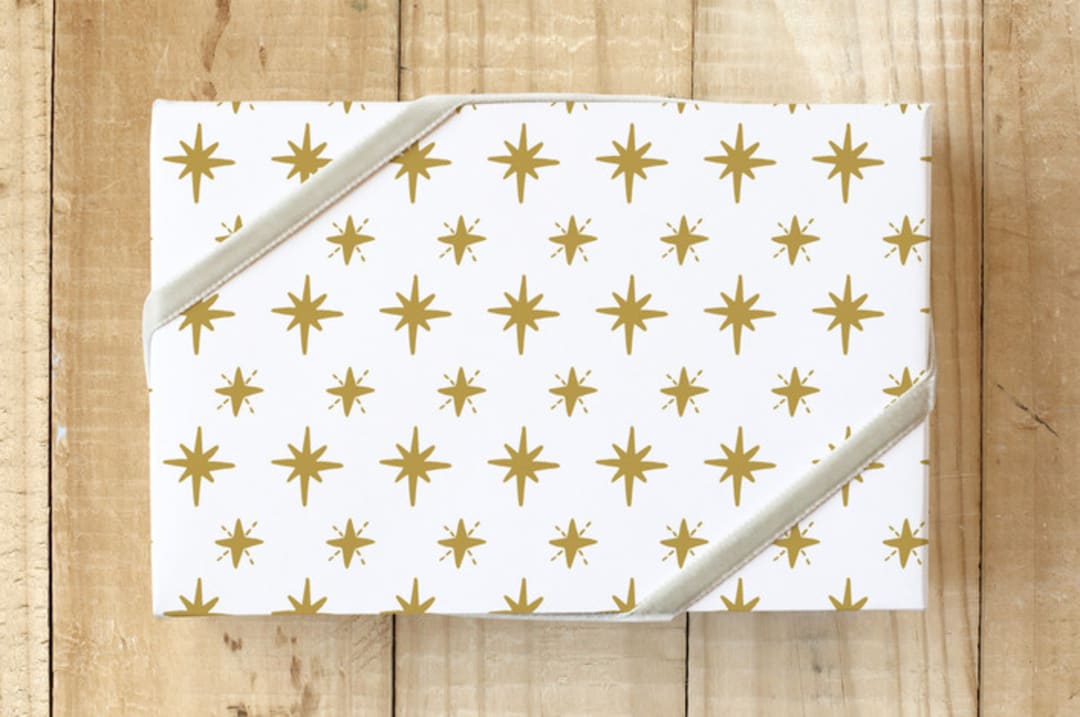 "Bright Stars" - Wrapping Paper in Golden by Nicole Barreto - Front