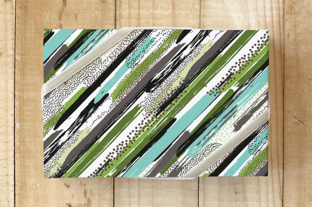 "Sketchy Strokes " - Wrapping Paper in Tree Green by Simi Gauba - Front