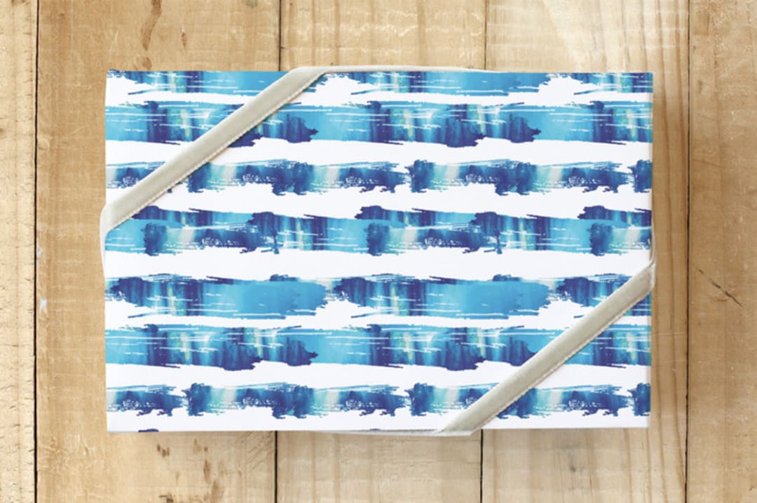 "Brush Stroke Stripes" - Wrapping Paper in Bright Blues by Lauren Hughes - Front