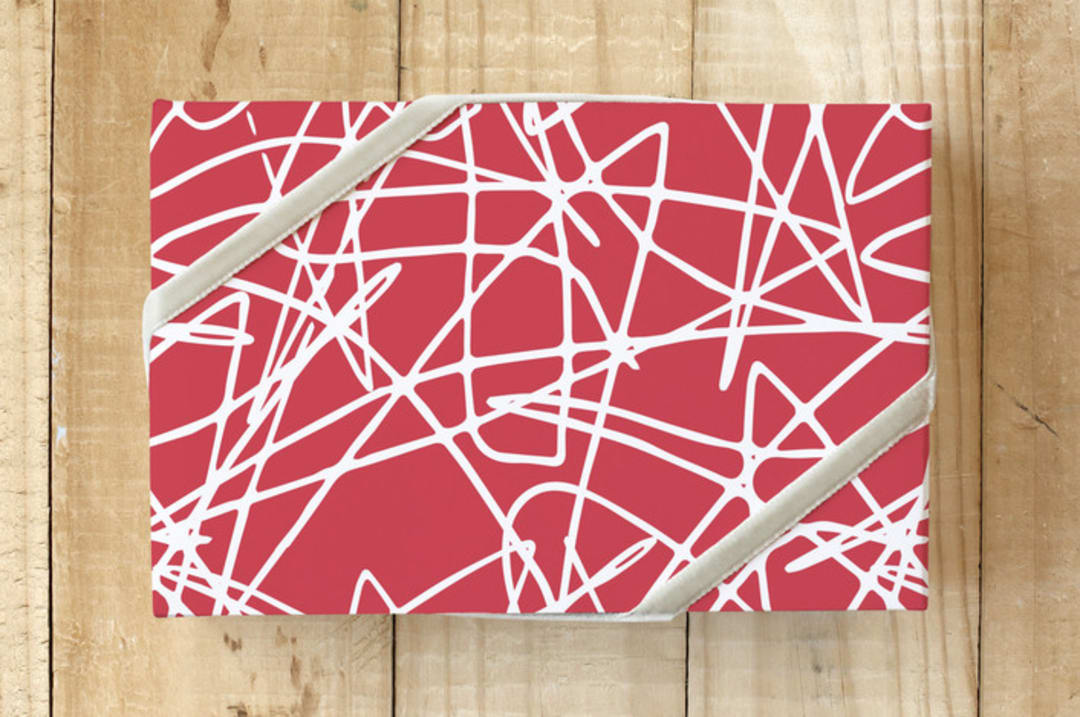"Ice Tracks" - Wrapping Paper in Celebration Red by Jan Shepherd - Front