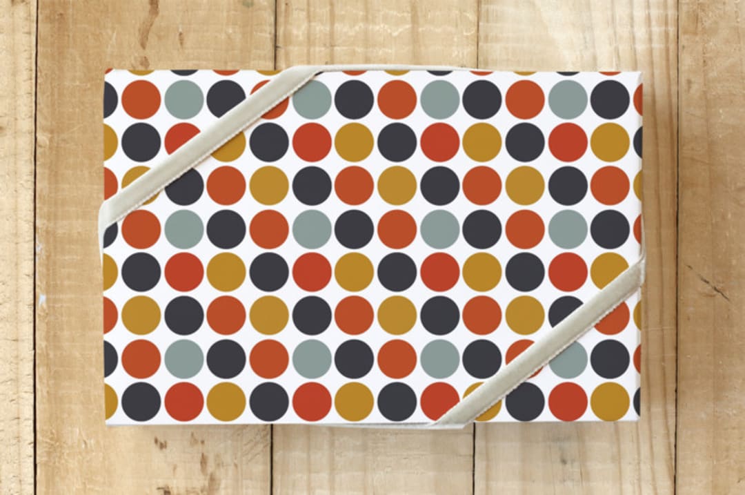 "Dots & Spots" - Wrapping Paper in Rust by MinimalType - Front