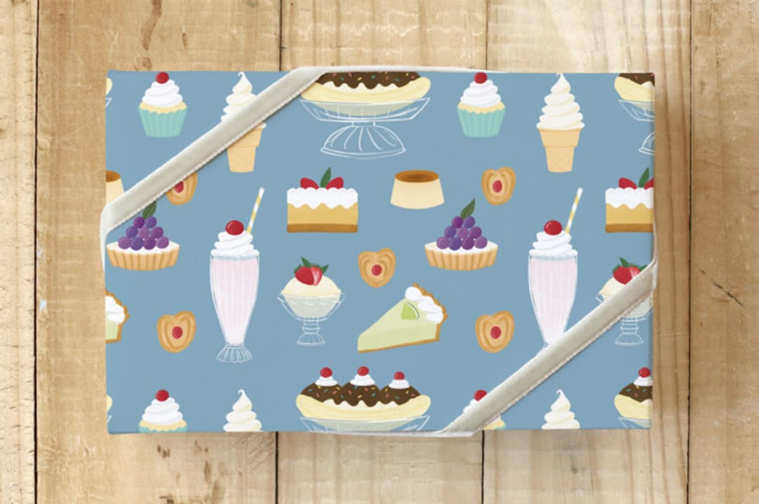 "Desserts" - Wrapping Paper in blue by Jessie Burch - Front