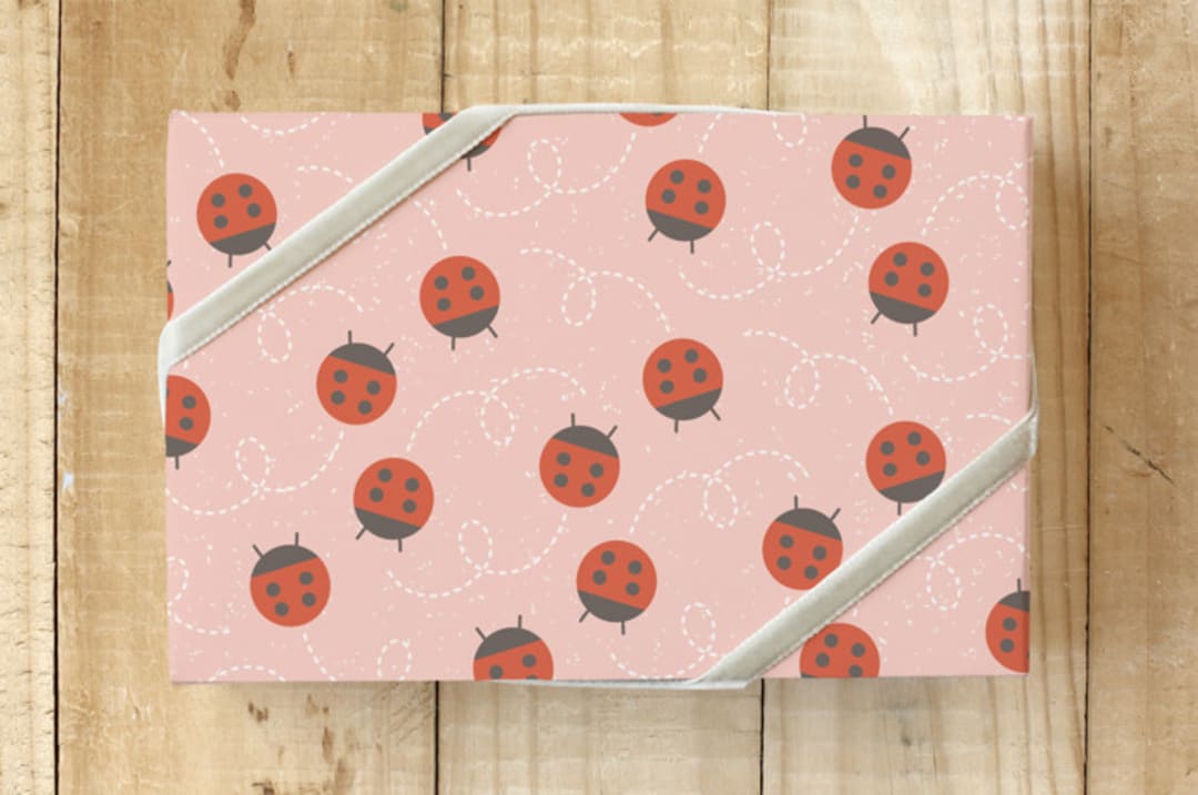 "Flying Ladybug Gift Wrap" - Wrapping Paper in Apricot by Amber Barkley - Front
