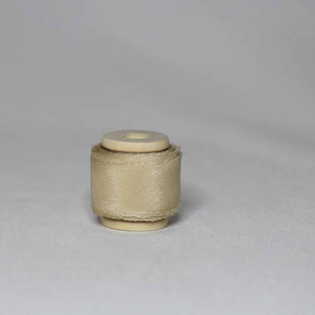 "Sand Plant-Dyed Silk Ribbon, Narrow" - Ribbons in beige by Katelyn Cash