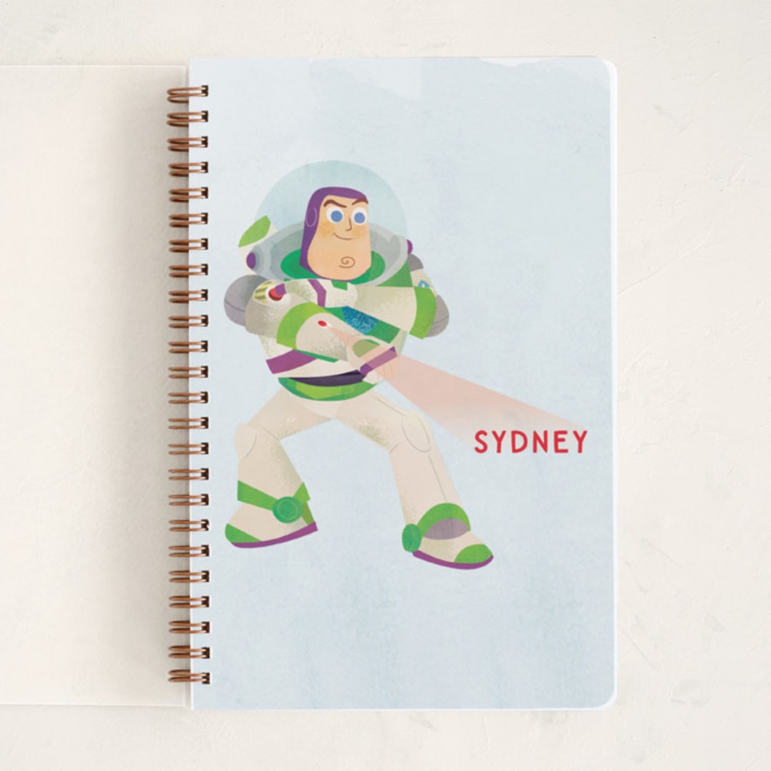 "Disney and Pixar Buzz's Laser" - Notebook in Cobalt by Lori Wemple - Front
