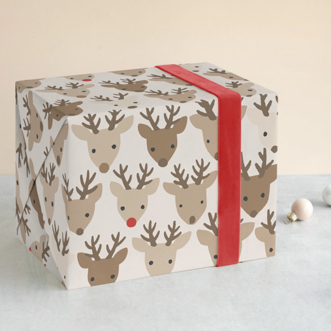 "Red nose" - Wrapping Paper in Almond by Jessie Steury - Front